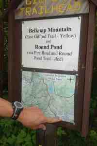 Uncle Scott pointing out that the Klem summit is right here... directly under the legend on the trail map to Belkap